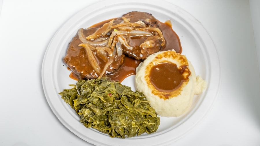 Hamburger steak with gravy and greens